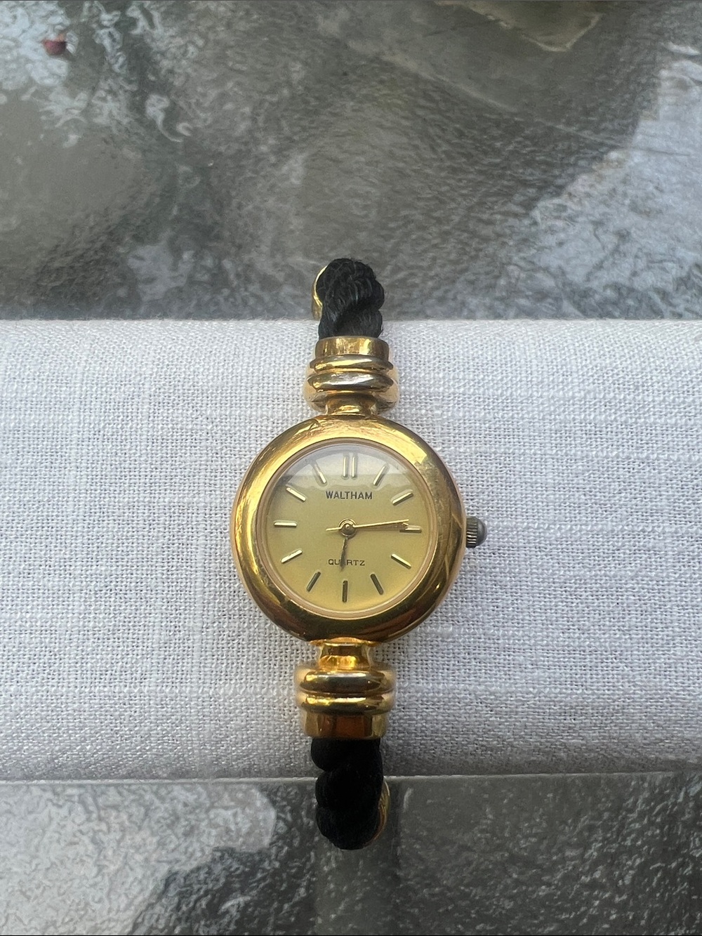 Waltham Vintage- Gold-Tone Women’s Quartz Watch with Black Braided Strap.